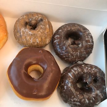 Texas Donuts - I asked for chocolate frosting like the bottom left to be added to the two chocolate glazed donuts. The manager told me NO! - Donuts Near Me - Lorton, Virginia Texas Donuts - I asked for chocolate frosting like the bottom left to be added to the two chocolate glazed donuts. The manager told me NO! - Donuts Near Me - Lorton, Virginia