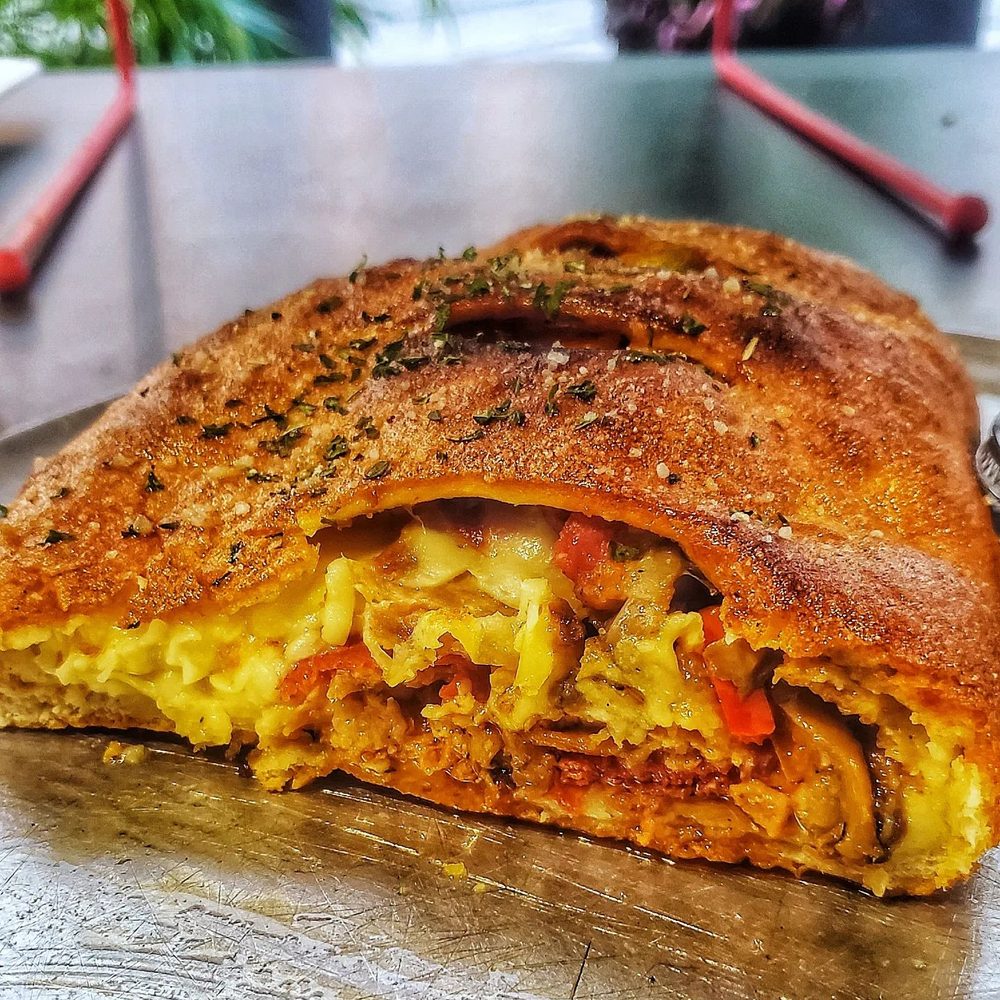 Palace Pizza - Inside a Calzone. Very Filling - Pizza Near Me - Lakeland, Florida Palace Pizza - Inside a Calzone. Very Filling - Pizza Near Me - Lakeland, Florida