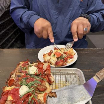 Pizza Rock - How he ate it! - Pizza Near Me - Henderson, Nevada