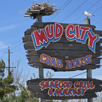 Mud City Crab House - Osprey nest on sign. It's the seashore! - Seafood Near Me - Manahawkin, New Jersey Mud City Crab House - Osprey nest on sign. It's the seashore! - Seafood Near Me - Manahawkin, New Jersey
