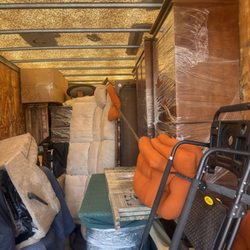College Boy Movers - Helping a customer load a 28' trailer.