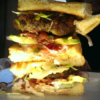 Bosscat Kitchen & Libations - the NEW black-eyed pea fritter club is STACKED - New American Near Me - Irvine, California