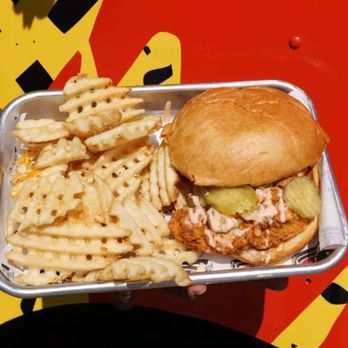 The Lick Houston - a chicken sandwich and french fries - Food Trucks Near Me The Lick Houston - a chicken sandwich and french fries - Food Trucks Near Me