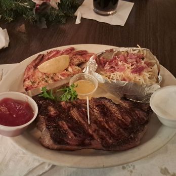 Spillway Lodge - New York Steak with a loaded baked potato and shrimp - Steakhouses Near Me - Clarksville, Ohio Spillway Lodge - New York Steak with a loaded baked potato and shrimp - Steakhouses Near Me - Clarksville, Ohio