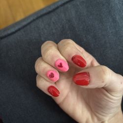 Star Nails - Did not want this shape of nail, and asked for different nail design on top of being cut on both hands around nails