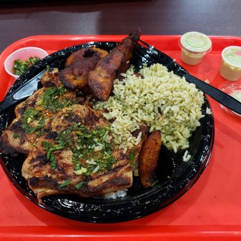Kachi's Chicken - Pork chops with fried plantain and cilantro rice. Delicious!!!!! - Peruvian Near Me - Suitland, Maryland Kachi's Chicken - Pork chops with fried plantain and cilantro rice. Delicious!!!!! - Peruvian Near Me - Suitland, Maryland