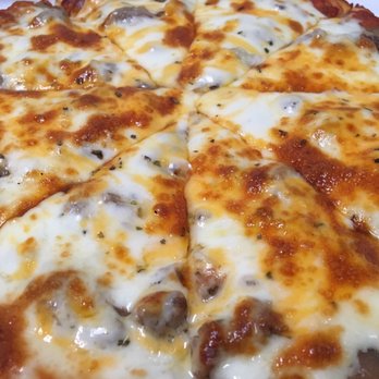 Pizza by Marchelloni - Cheesy goodness! - Pizza Near Me - Pontiac, Illinois