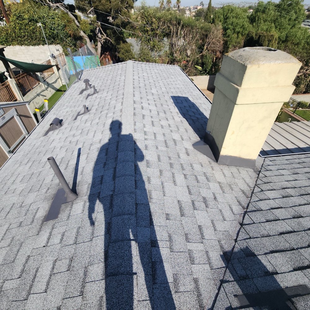 Slide of Pro Roofing Experts