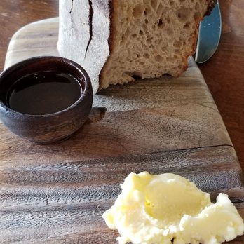 Rustic Canyon - $7 Milo & Olive Bread served w/cultured butter, enzo olive oil & SB salt. Recommend getting this since there's no complimentary bread. - Wine Bars Near Me - Santa Monica, California Rustic Canyon - $7 Milo & Olive Bread served w/cultured butter, enzo olive oil & SB salt. Recommend getting this since there's no complimentary bread. - Wine Bars Near Me - Santa Monica, California