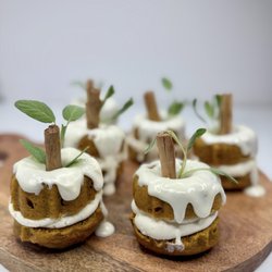 Grace’s Artisan Sweets - Pumpkin spice mini cakes - Pumpkin spice cake layered w/ a rich cream cheese frosting & topped w/ a cream cheese frosting