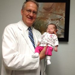 John D Holmes, MD - Dr. Holmes with my youngest Lucy. In 2013