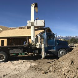 Mountain Top - This was a difficult site. The Septic Tank had to be lifted over the house with great care to get into the hole.