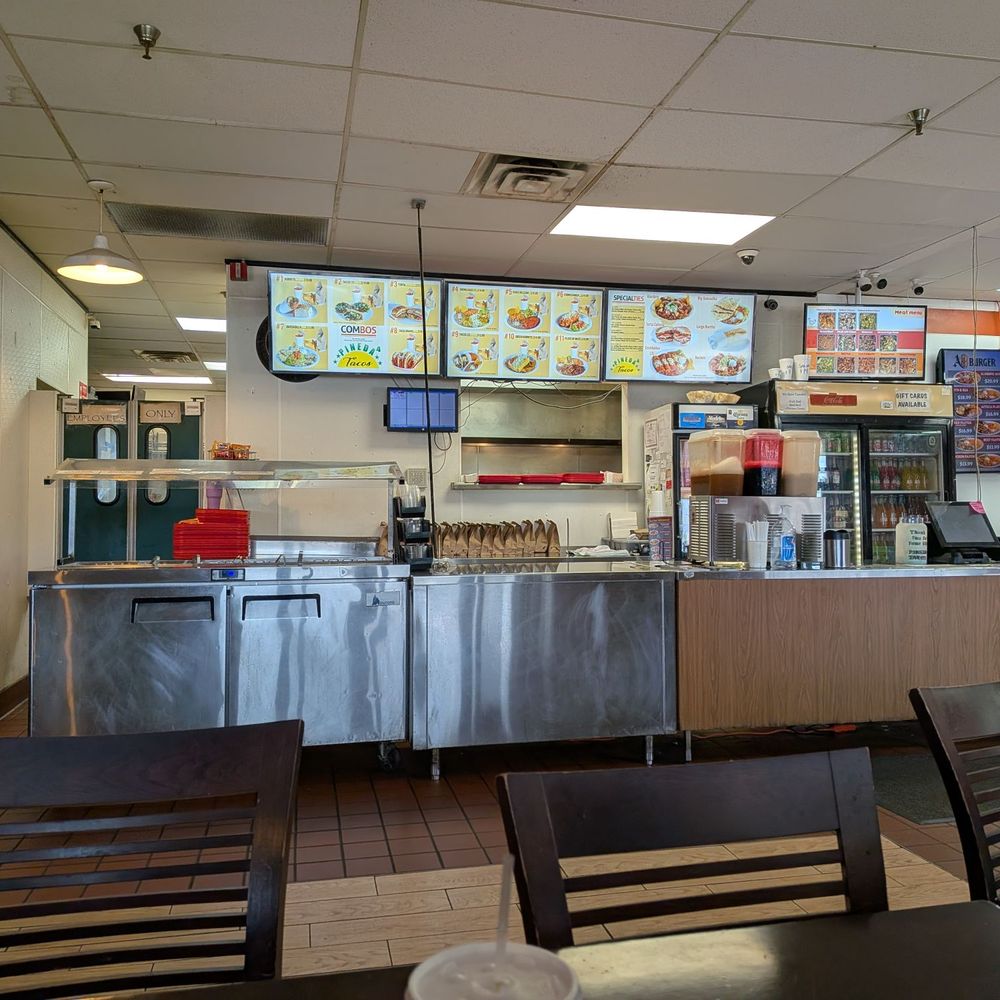 Order counter and salsa bar. Order counter and salsa bar.