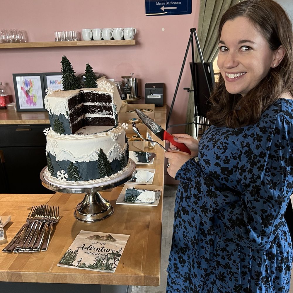 Cain's Creative Cakes - a woman cutting a cake - Custom Cakes Near Me - Denver, Colorado