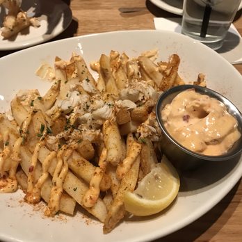 Bonefish Grill - French fries With the lump crab meat and boom boom shrimp sauce - Seafood Near Me - Johnstown, Colorado