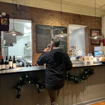 The Independent WIne - a man standing at the counter - Wine Bars Near Me - Sonora, California The Independent WIne - a man standing at the counter - Wine Bars Near Me - Sonora, California
