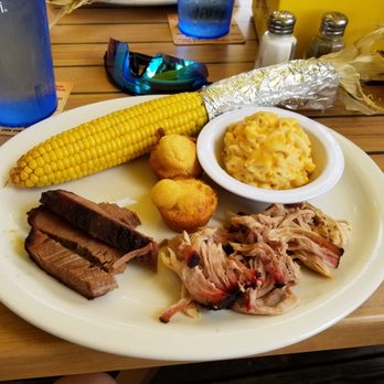 Slow and Low Bar B Que - Pork and Brisket with roasted corn on the cob, mac and cheese with corn bread - American Near Me - Cocoa Beach, Florida Slow and Low Bar B Que - Pork and Brisket with roasted corn on the cob, mac and cheese with corn bread - American Near Me - Cocoa Beach, Florida