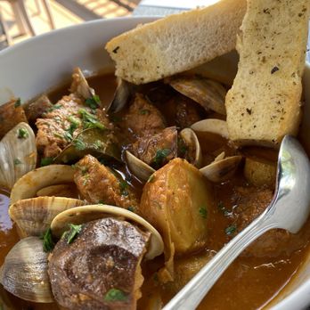 Assados Kitchen & Bar - Pork and Clams - Bars Near Me - Harmony, Rhode Island