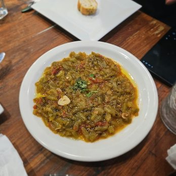 Le Petit Pêcheur - Hammis Dip- Roasted pepper, tomato, garlic sautéed in olive oil. $8. A nice warm dish to go with the bread - Seafood Near Me - Astoria, New York