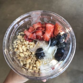 JuiceWell - Aerial view of my to-go açaí bowl. Toppings: strawberries, blueberries, coconut chips, and granola - Juice Bars & Smoothies Near Me - Houston, Texas JuiceWell - Aerial view of my to-go açaí bowl. Toppings: strawberries, blueberries, coconut chips, and granola - Juice Bars & Smoothies Near Me - Houston, Texas