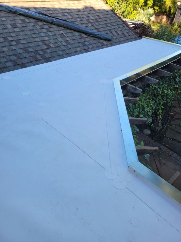 Slide of Rouse Roofing