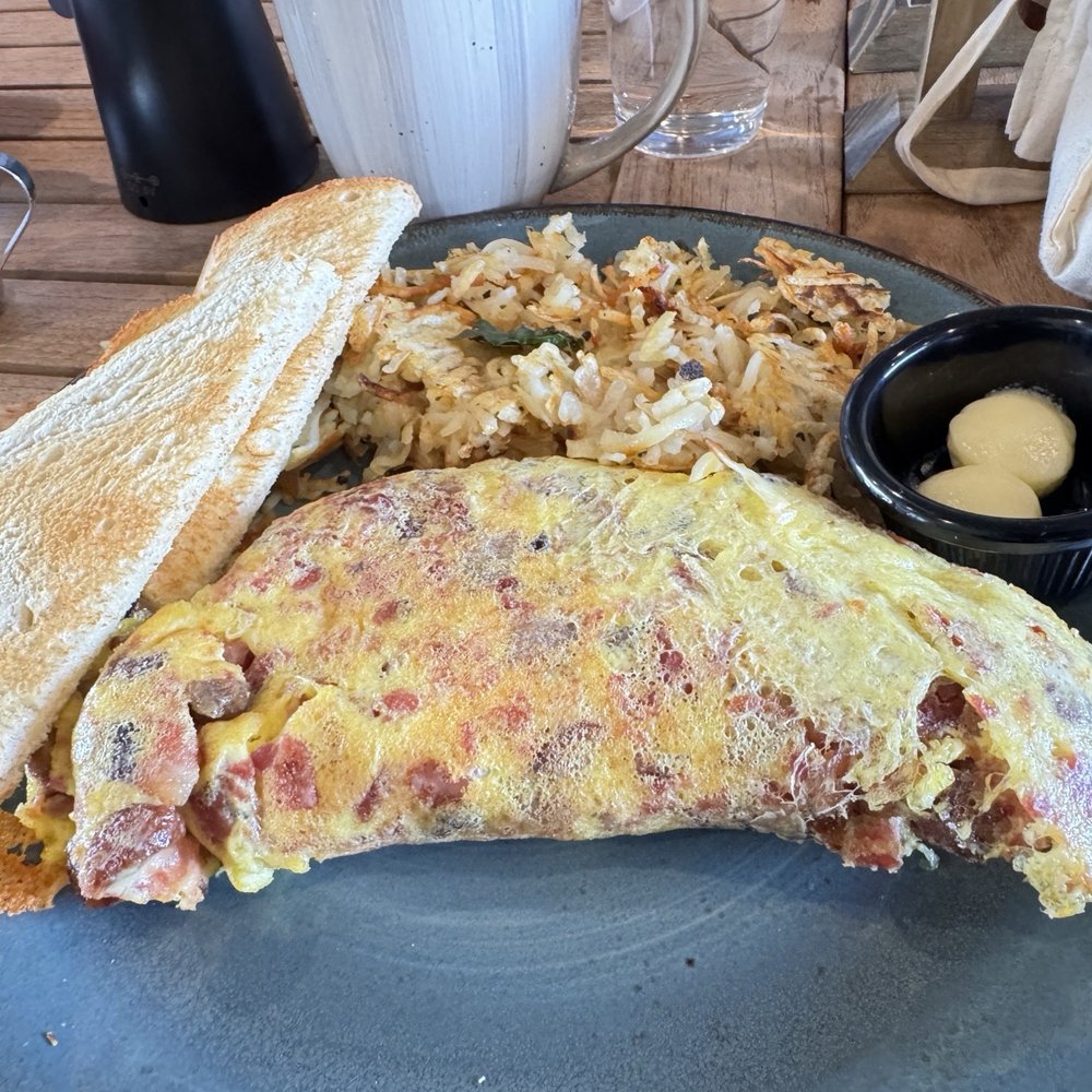 The Hub - The meat lover's omelette with sourdough bread. - Breakfast & Brunch Near Me - Heber City, Utah The Hub - The meat lover's omelette with sourdough bread. - Breakfast & Brunch Near Me - Heber City, Utah