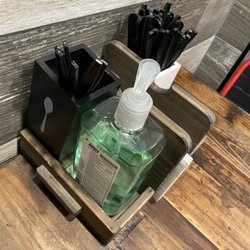 Chicken Stop - Hand sanitizer on the tables.