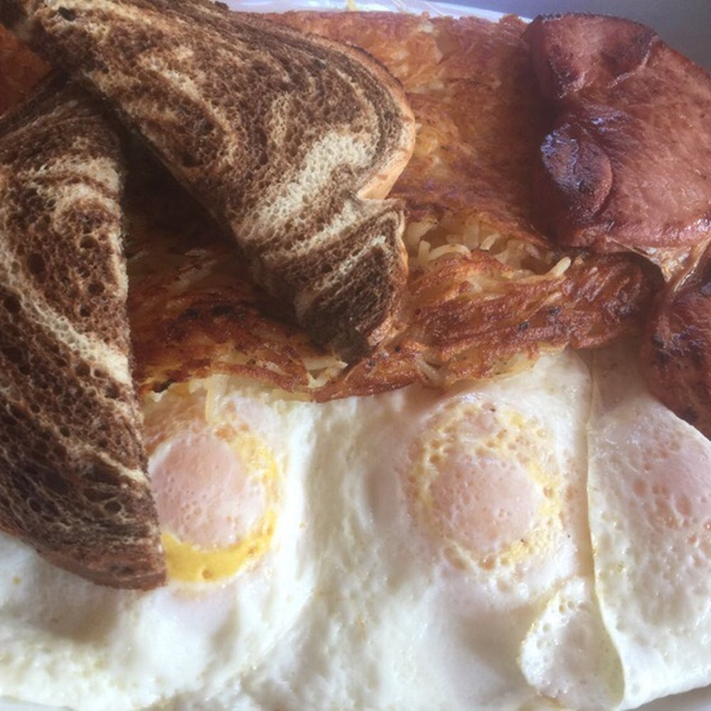 Billy Gail's - 3 eggs over medium, rye toast and country ham just part of the belly buster breakfast - American Near Me - Branson, Missouri Billy Gail's - 3 eggs over medium, rye toast and country ham just part of the belly buster breakfast - American Near Me - Branson, Missouri