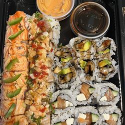 Zushi Dozo - Roll of Grace, Trifecta Roll, eel avocado, and Philly Roll