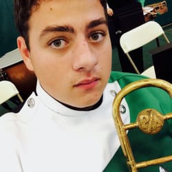 Costa Mesa Middle & High School - A student getting ready for a district band performance
