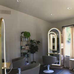 Mirror Mirror Beaute Bar - Styling chairs along the front windows. Afternoon light, which is the best light for checking color.