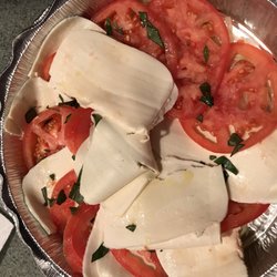 Valentino's Gourmet Pizza - Very strange looking with thin slices and plain.