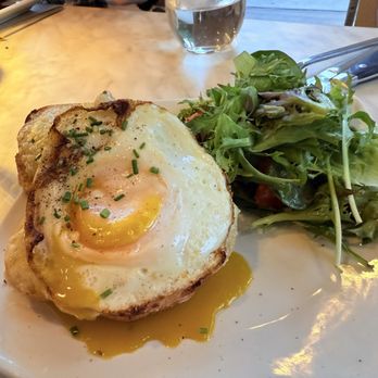 Cognac - Croque Madame sandwich. I don't think the egg should be broken on a $15 sandwich. - French Near Me - St. Petersburg, Florida Cognac - Croque Madame sandwich. I don't think the egg should be broken on a $15 sandwich. - French Near Me - St. Petersburg, Florida