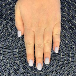 Around my cuticles the powder is uneven and looks messy. My nails are still slanted.