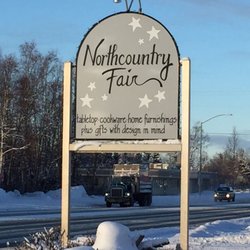 Northcountry fair - Sign pylon at the curb of Kenai Spur Hwy.