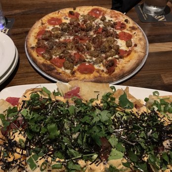 Yard House - The Carnivore Pizza & Poke Nachos - New American Near Me - Brea, California Yard House - The Carnivore Pizza & Poke Nachos - New American Near Me - Brea, California