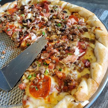 Brick Oven Pizza - Their Supreme sans bell pepper and olives. Betta than getting the meat and adding mushrooms for additional charge. - Pizza Near Me - Kapolei, Hawaii Brick Oven Pizza - Their Supreme sans bell pepper and olives. Betta than getting the meat and adding mushrooms for additional charge. - Pizza Near Me - Kapolei, Hawaii