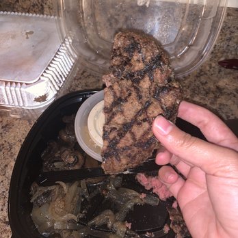 Texas Roadhouse - This is supposed to be steak but it looks like a burger patty - American Near Me - Bowie, Maryland