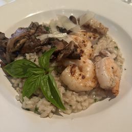 Mushroom risotto with grilled shrimp. Mushroom risotto with grilled shrimp.
