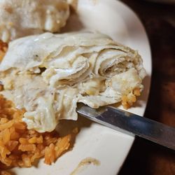 El Palmar - "Suizo" burrito... 6 shreds of mozzarella cheese on top, literally nothing but 3-4 beans and maybe an ounce of meat in the entire burrito