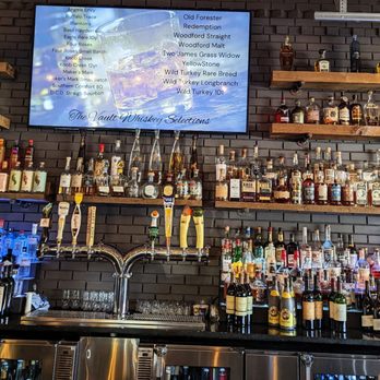 The Vault - a bar with many bottles of alcohol - Seafood Near Me - Wyandotte, Michigan The Vault - a bar with many bottles of alcohol - Seafood Near Me - Wyandotte, Michigan