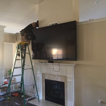 Electronic Minions - In Progress Shots *Note* We Recommend to the Client this TV not to be installed in front of an Air vent and to get the air redirected - Home Theatre Installation Near Me