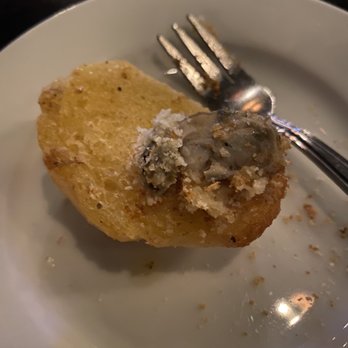 The Drunken Oyster - Garlic butter crostini served with broiled oysters - Cajun/Creole Near Me - Amarillo, Texas