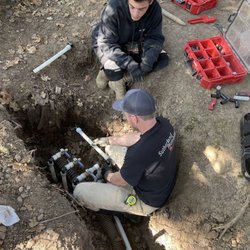 Cameron Bloom & Jack Tolle making final connections to main underground water pipe.