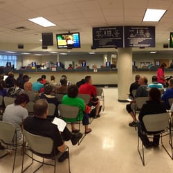 Connecticut DMV - This is a picture showing 12 service windows with only 2 operating. Absolutely dreadful.
