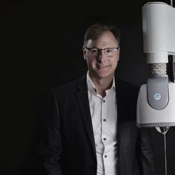 NuMe TMS Clinics - Dr. Kent with Brainsway deep TMS helmet