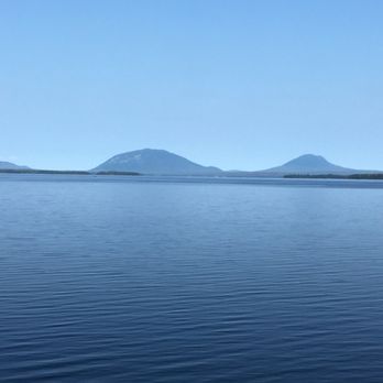Katahdin Cruises - There are a lot of mountains but there is no test on all the names for them that he mentions - Museums Near Me - Greenville, Maine