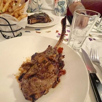 The Capital Grille - Tomahawk Veal Chop with Sage Butter, Marsala Jus and Crispy Prosciutto - Steakhouses Near Me - Phoenix, Arizona