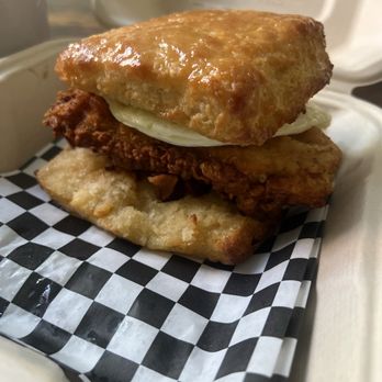 Fat's Fried Chicken & Waffles - Buttery Fried chicken biscuit glazed with honey with fried egg. - Southern Near Me - Seattle, Washington