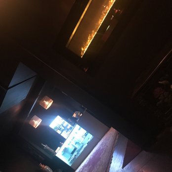 Noir Hookah Lounge - a pizza on a table - Hookah Bars Near Me - Highlands Ranch, Colorado